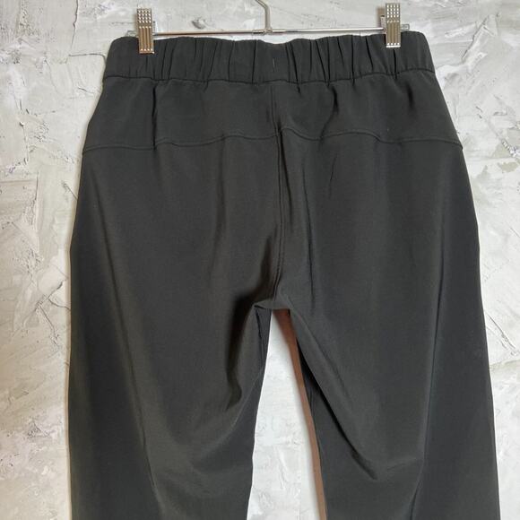 Lululemon On The Fly Pant Woven 28" SIZE 6 Black Joggers Flowing Fabric Travel - Picture 8 of 11